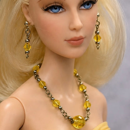 Light Yellow Glass Crystal Doll Necklace Earring Set. The necklace measures 4.5 inches long. Necklace and earrings shown on 16” Madame Alexander - Alex doll 