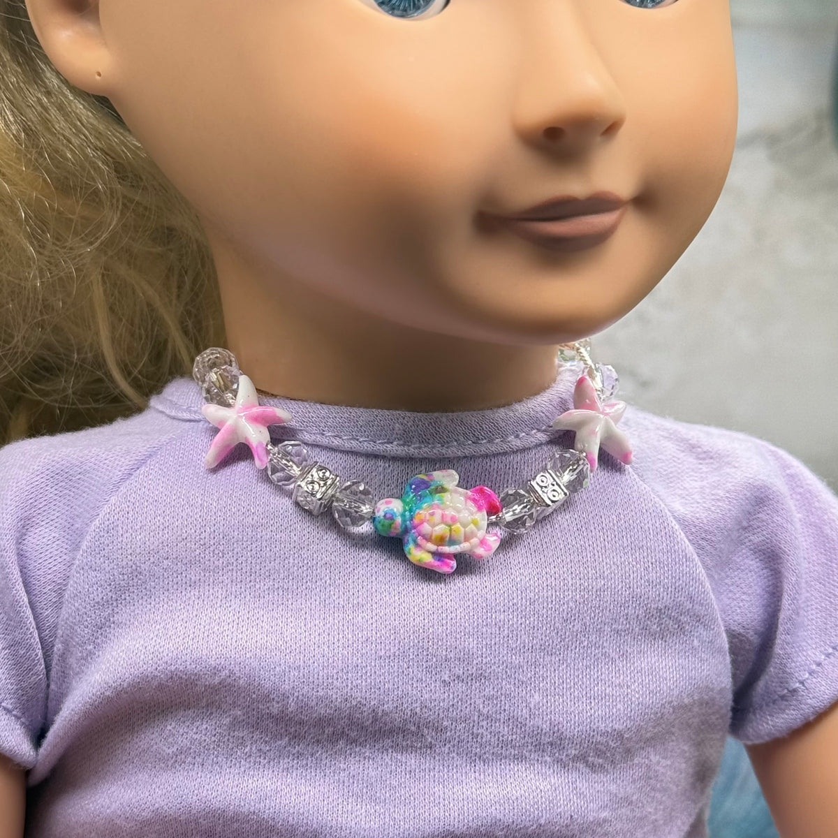 ✨ Handmade Doll Jewelry Designed to Fit popular 18 Inch Fashion Dolls: add a stylish touch to your favorite doll ✨

Multi Color Starfish Sea Turtle Beaded Doll Necklace