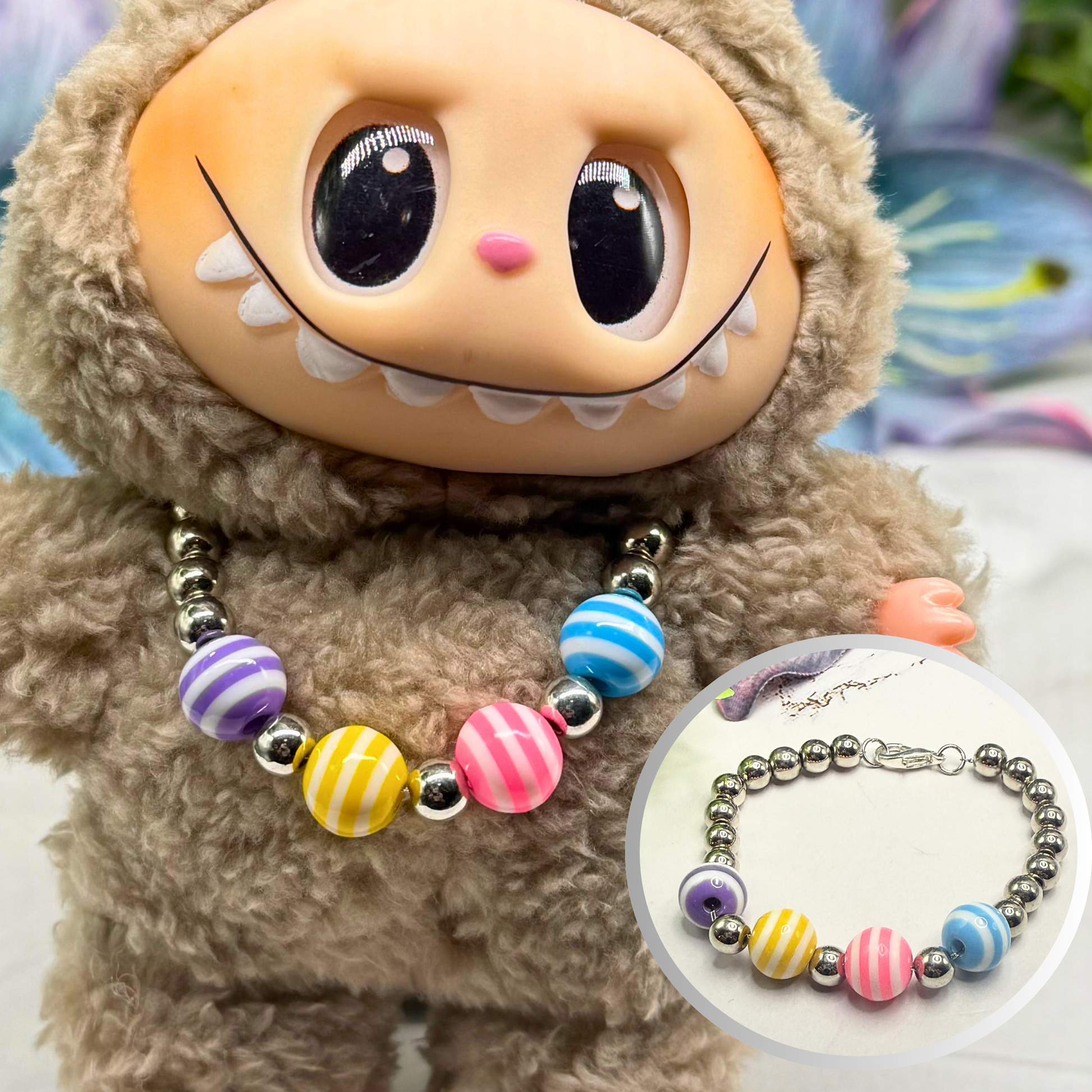 ✨Handmade Jewelry Designed to fit popular 17 to 20 cm (6 to 7 inch) Plush Labubu Monster Dolls: add a stylish touch to your favorite plushie! ✨

Multi Color Striped Bead Silver Ball Necklace