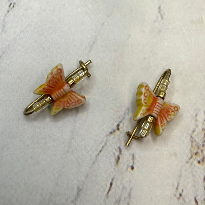 Handmade Doll Accessories Designed to Fit popular 14-18 inch Fashion Dolls: add a stylish touch to your favorite doll! Set of 2 charming Orange Coral Beige Acrylic Beaded Butterfly Doll Hair Barrettes