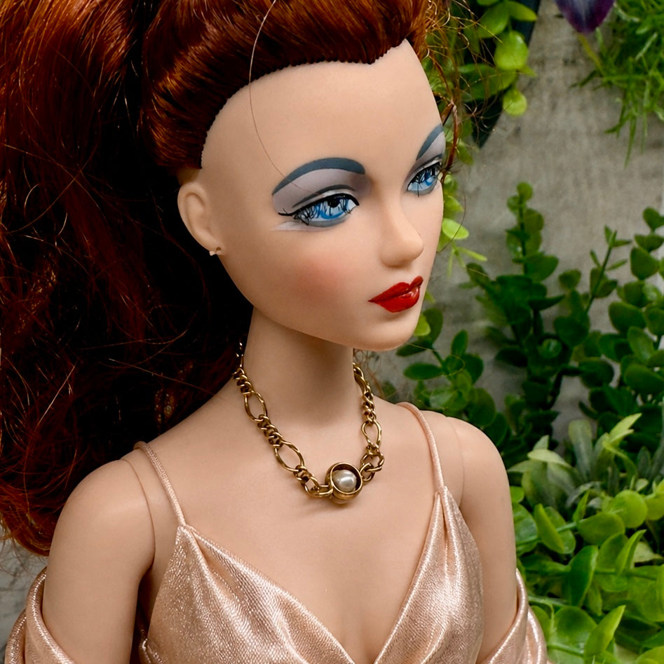 Pearl Accent Gold Large Link Chain Doll Necklace. The necklace is 3.25 inches long. Necklace shown on 16” Ashton Drake - Gene doll