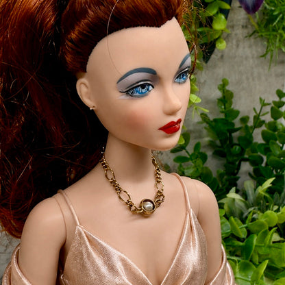 Pearl Accent Gold Large Link Chain Doll Necklace. The necklace is 3.25 inches long. Necklace shown on 16” Ashton Drake - Gene doll