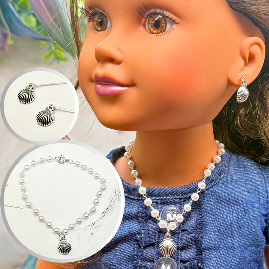 ✨Handmade Doll Jewelry Designed to Fit popular 18 Inch Fashion Dolls: add a little “Summer Fun ☀️ Beachy Style 🏝️” to your favorite doll!✨

Pearl Beaded Silver Shell Charm Doll Necklace & Earrings Set