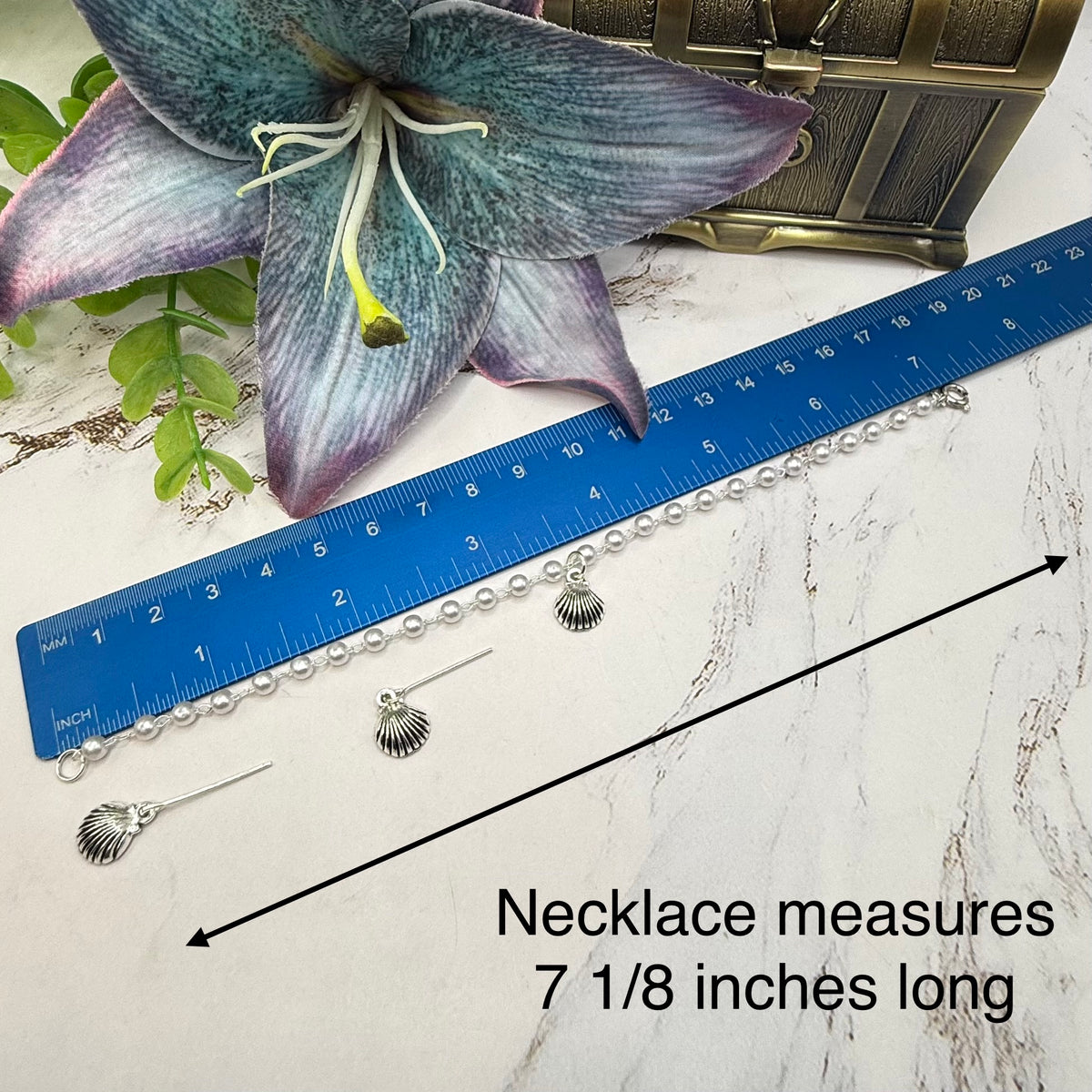 ✨Handmade Doll Jewelry Designed to Fit popular 18 Inch Fashion Dolls: add a little “Summer Fun ☀️ Beachy Style 🏝️” to your favorite doll!✨

Pearl Beaded Silver Shell Charm Doll Necklace & Earrings Set