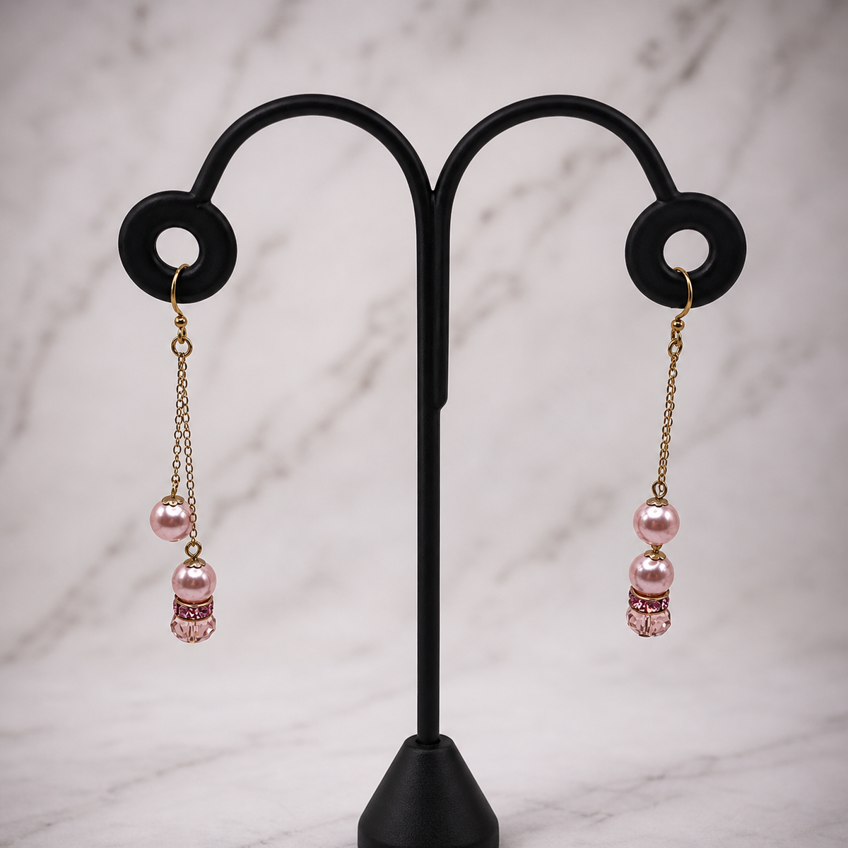 Pretty pink crystal, faux pearl, rhinestone and gold tone chain handmade dangle earrings. These earrings measure 2.5 inches long.