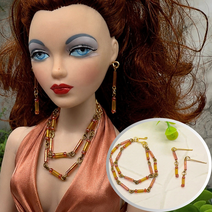 Pink Orange Glass Tubular Beaded Doll Necklace Earrings Set. Necklace measures 3.75” inches long. Necklace and earrings shown on Ashton Drake - Gene doll 