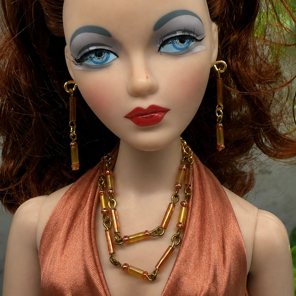 Pink Orange Glass Tubular Beaded Doll Necklace Earrings Set. Necklace measures 3.75” inches long. Necklace and earrings shown on Ashton Drake - Gene doll 