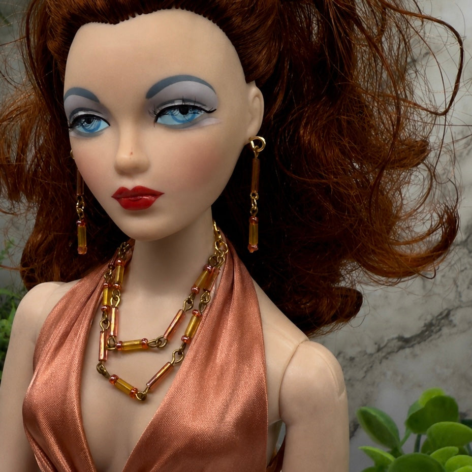 Pink Orange Glass Tubular Beaded Doll Necklace Earrings Set. Necklace measures 3.75” inches long. Necklace and earrings shown on Ashton Drake - Gene doll 