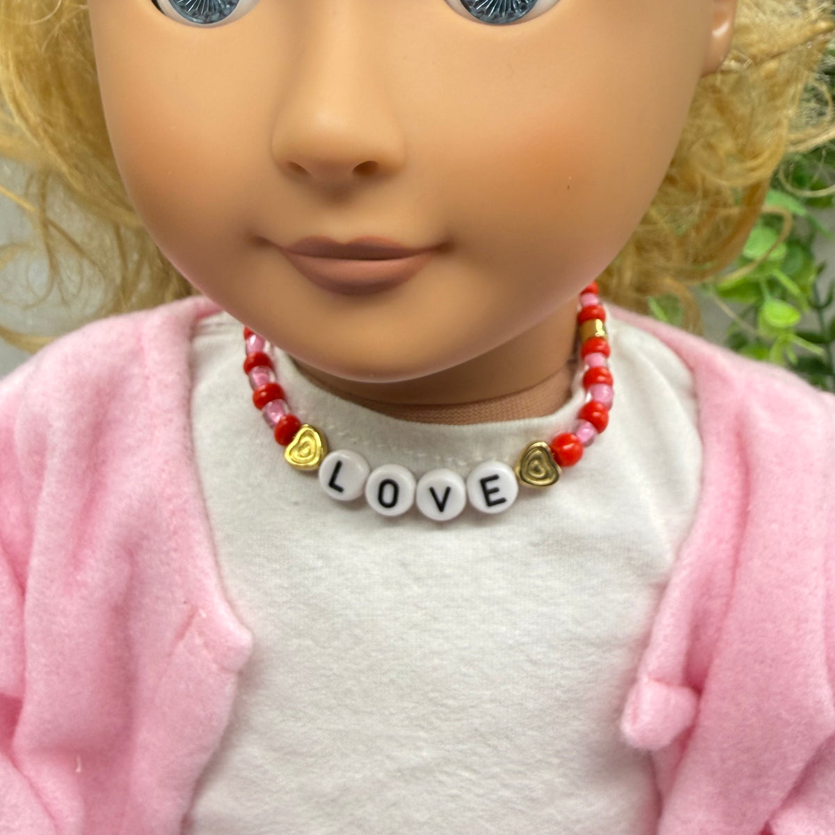 ✨Handmade Doll Jewelry Designed to Fit popular 18 Inch Fashion Dolls: add some “Valentine’s Day 💕” style to your favorite doll!✨ Pink Red Beaded LOVE Heart Valentine’s Day Doll Necklace • Necklace measures 6-7/8 inches long • Doll Size / Scale: Pics included with necklace shown on 18" Our Generation doll (neck measures 6 inches around).
