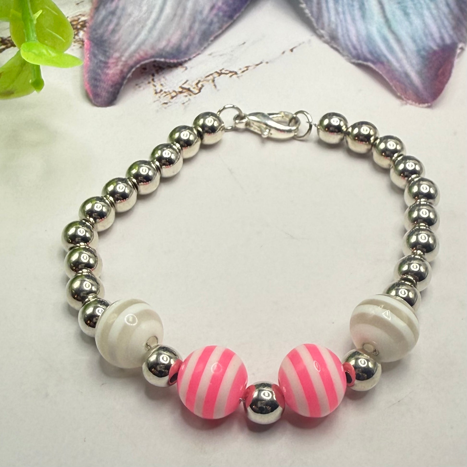✨Handmade Jewelry Designed to fit popular 17 to 20 cm (6 to 7 inch) Plushie Labubu Monster Dolls: add a stylish touch to your favorite plushie! ✨

Pink White Striped Ball Beaded Silver Necklace