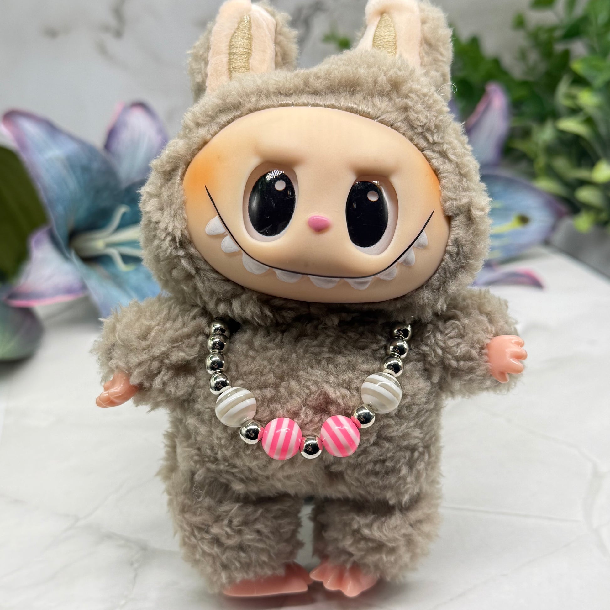 ✨Handmade Jewelry Designed to fit popular 17 to 20 cm (6 to 7 inch) Plushie Labubu Monster Dolls: add a stylish touch to your favorite plushie! ✨

Pink White Striped Ball Beaded Silver Necklace
