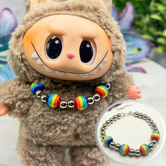 ✨Handmade Jewelry Designed to fit popular 17 to 20 cm (6 to 7 inch) Plushie Labubu Monster Dolls: add a stylish touch to your favorite plushie! ✨

Rainbow Striped Ball and Silver Beaded Necklace