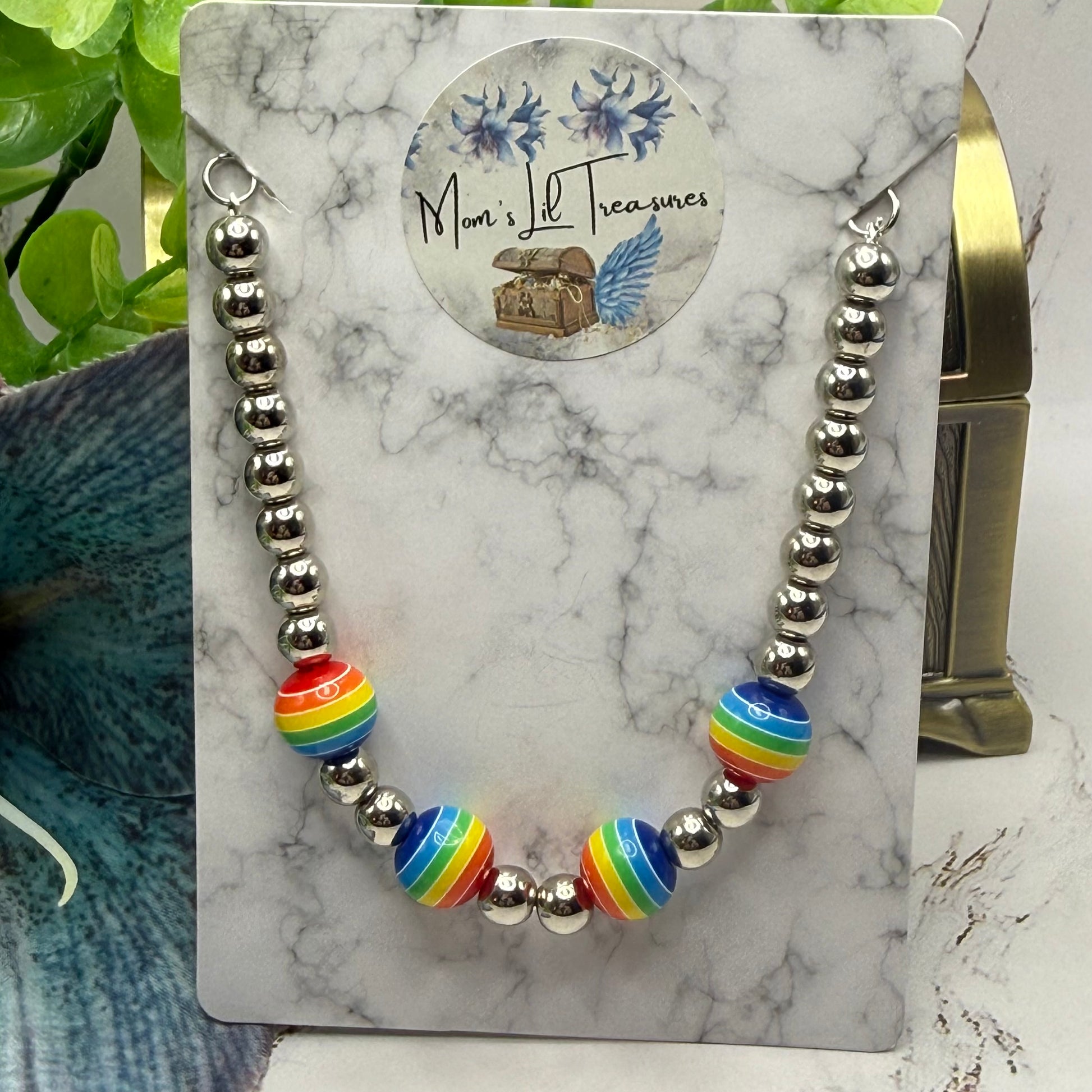 ✨Handmade Jewelry Designed to fit popular 17 to 20 cm (6 to 7 inch) Plushie Labubu Monster Dolls: add a stylish touch to your favorite plushie! ✨

Rainbow Striped Ball and Silver Beaded Necklace