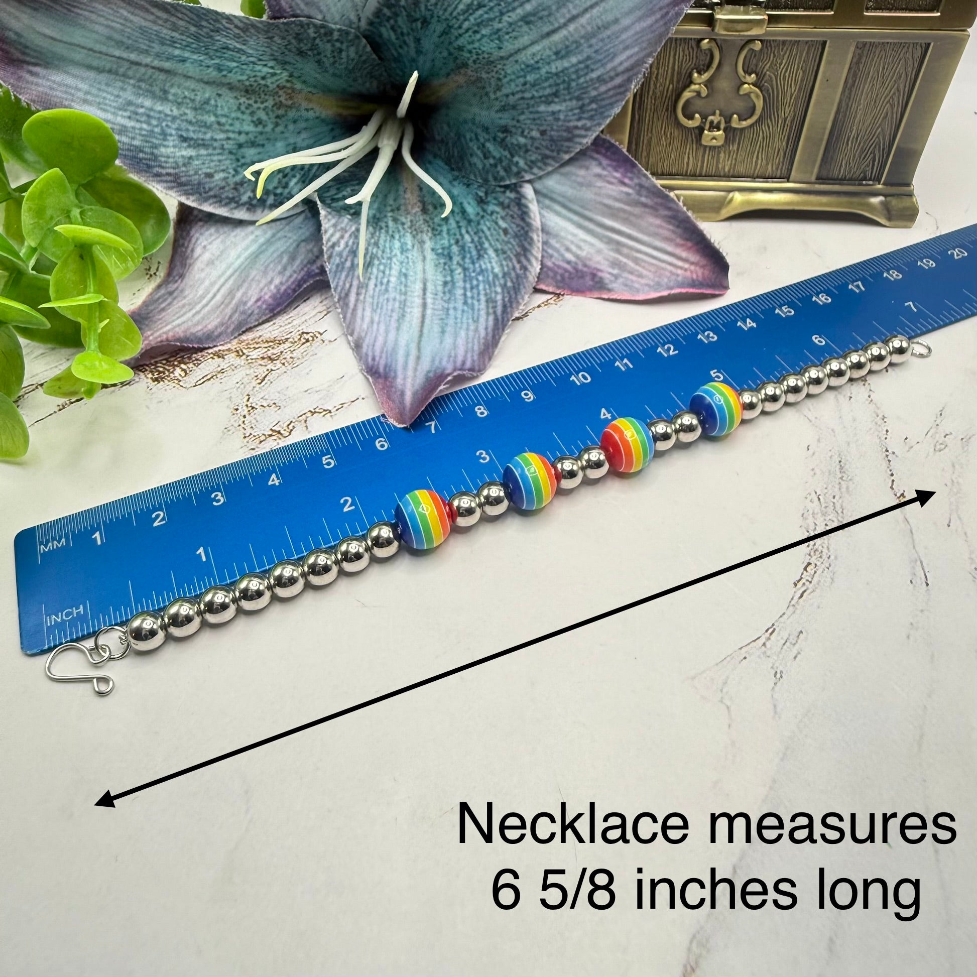 ✨Handmade Jewelry Designed to fit popular 17 to 20 cm (6 to 7 inch) Plushie Labubu Monster Dolls: add a stylish touch to your favorite plushie! ✨

Rainbow Striped Ball and Silver Beaded Necklace