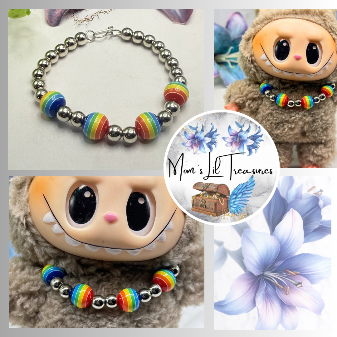 ✨Handmade Jewelry Designed to fit popular 17 to 20 cm (6 to 7 inch) Plushie Labubu Monster Dolls: add a stylish touch to your favorite plushie! ✨

Rainbow Striped Ball and Silver Beaded Necklace