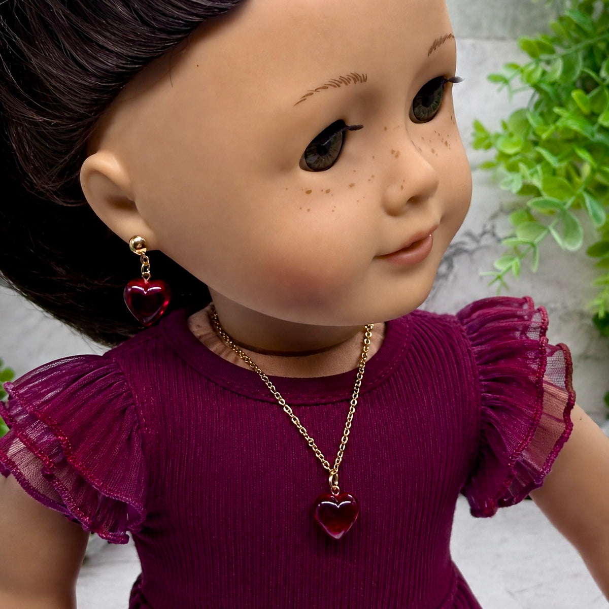 Red Burgundy Heart Pendant Gold Chain Doll Necklace & Earrings • EARRING POSTS ARE 2mm DIAMETER - for dolls with 2mm (drilled) pierced ears.  Necklace measures 6-5/8 inches long. • Necklace and earrings shown on 18" American Girl doll