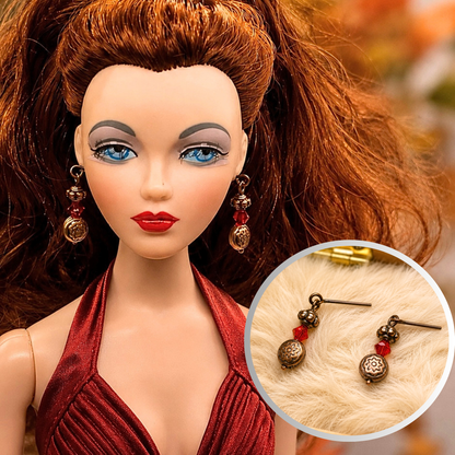 Add some style to your doll's outfit with these Red Glass Copper Dangle Doll Earrings. Earrings shown on 16” Ashton Drake - Gene doll.