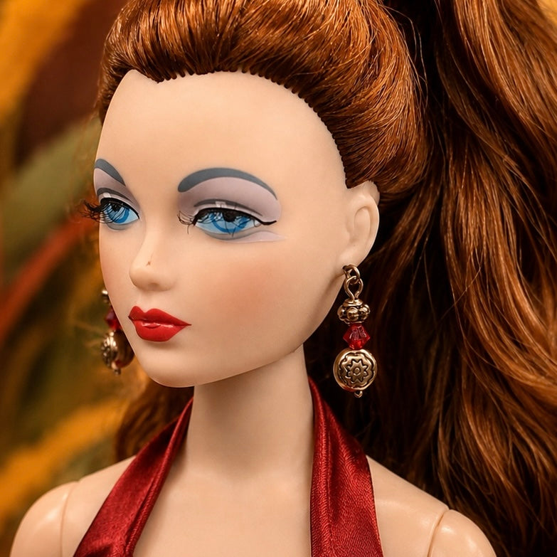 Add some style to your doll's outfit with these Red Glass Copper Dangle Doll Earrings. Earrings shown on 16” Ashton Drake - Gene doll.