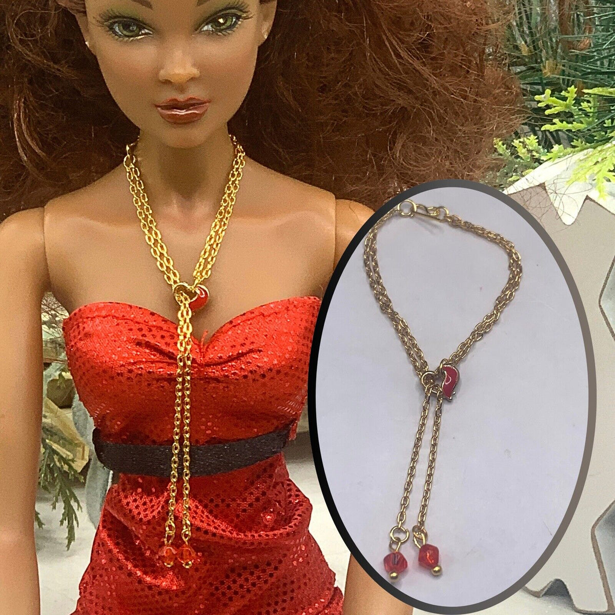 ✨Handmade Doll Jewelry Designed to Fit popular 16 Inch Fashion Dolls: add a stylish touch to your favorite doll!✨

Red Heart Slide Bolo Style Gold tone Chain with Red Crystal end accents Doll Necklace. Necklace measures approximately 4 - 5 inches long with slider style.