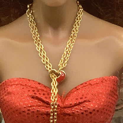 ✨Handmade Doll Jewelry Designed to Fit popular 16 Inch Fashion Dolls: add a stylish touch to your favorite doll!✨

Red Heart Slide Bolo Style Gold tone Chain with Red Crystal end accents Doll Necklace. Necklace measures approximately 4 - 5 inches long with slider style.