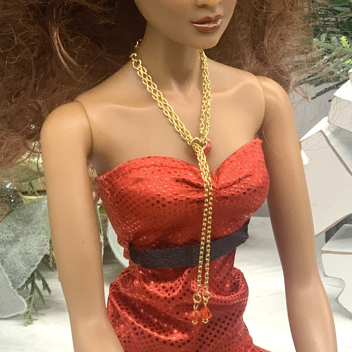 ✨Handmade Doll Jewelry Designed to Fit popular 16 Inch Fashion Dolls: add a stylish touch to your favorite doll!✨

Red Heart Slide Bolo Style Gold tone Chain with Red Crystal end accents Doll Necklace. Necklace measures approximately 4 - 5 inches long with slider style.