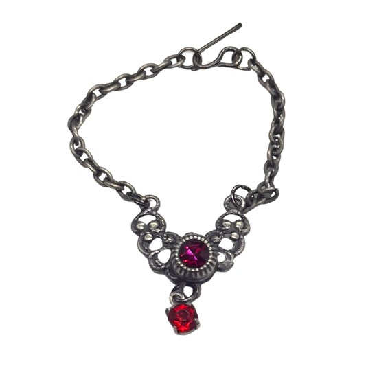 ✨Handmade Doll Jewelry Designed to Fit popular 16 Inch Fashion Dolls: add a stylish touch to your favorite doll!✨

Red Rhinestone Gunmetal Silver Filigree Collar Doll Necklace. This necklace measures 3.25 inches.