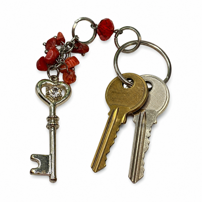 Silver Heart Top Key Charm Red Glass Stone Dangles Key Chain. Total length of key chain is 4-3/4 inches long. Ring is 7/8” diameter. Dangle section is 3-3/4 inches long.
Add this Key Chain for a touch of style!