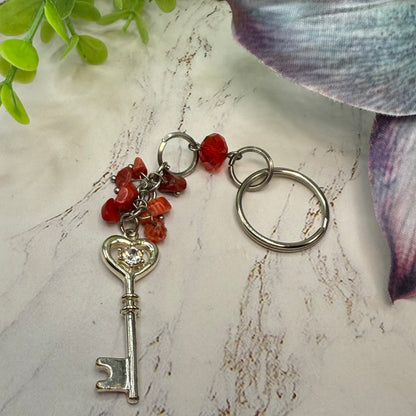 Silver Heart Top Key Charm Red Glass Stone Dangles Key Chain. Total length of key chain is 4-3/4 inches long. Ring is 7/8” diameter. Dangle section is 3-3/4 inches long.
Add this Key Chain for a touch of style!