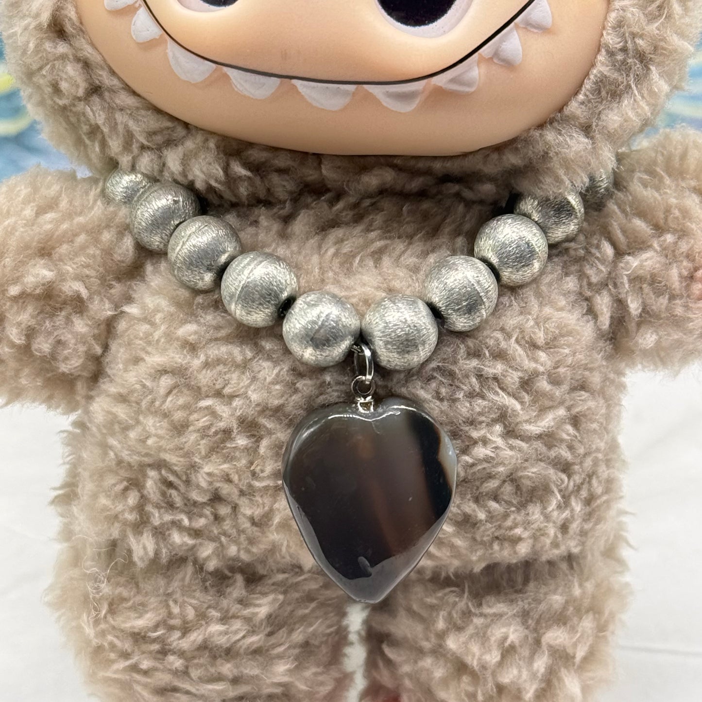 ✨Handmade Jewelry Designed to fit popular 17 to 20 cm (6 to 7 inch) Plushie Labubu Monster Dolls: add a stylish touch to your favorite plushie! ✨

Silver Metal Beaded Brown Glass Heart Charm Necklace
