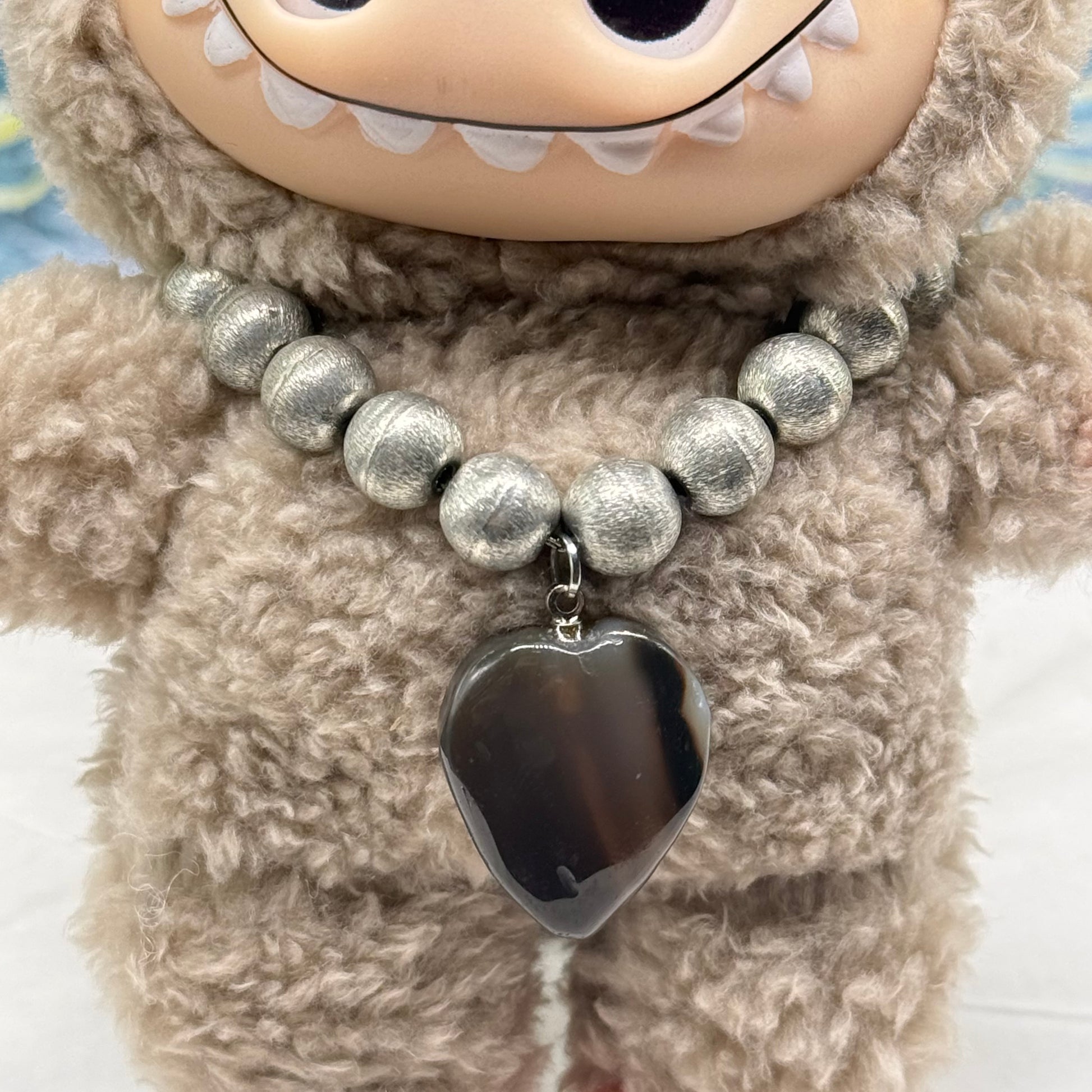 ✨Handmade Jewelry Designed to fit popular 17 to 20 cm (6 to 7 inch) Plushie Labubu Monster Dolls: add a stylish touch to your favorite plushie! ✨

Silver Metal Beaded Brown Glass Heart Charm Necklace
