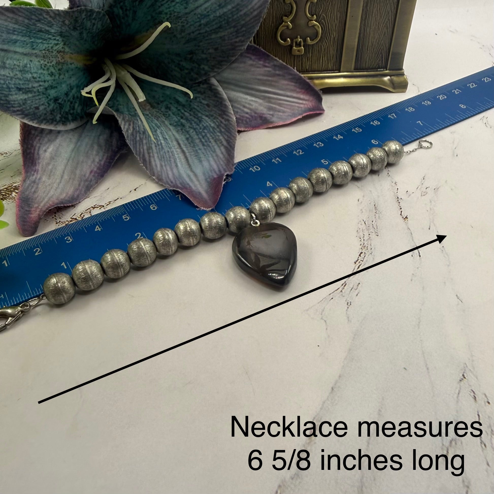 ✨Handmade Jewelry Designed to fit popular 17 to 20 cm (6 to 7 inch) Plushie Labubu Monster Dolls: add a stylish touch to your favorite plushie! ✨

Silver Metal Beaded Brown Glass Heart Charm Necklace
