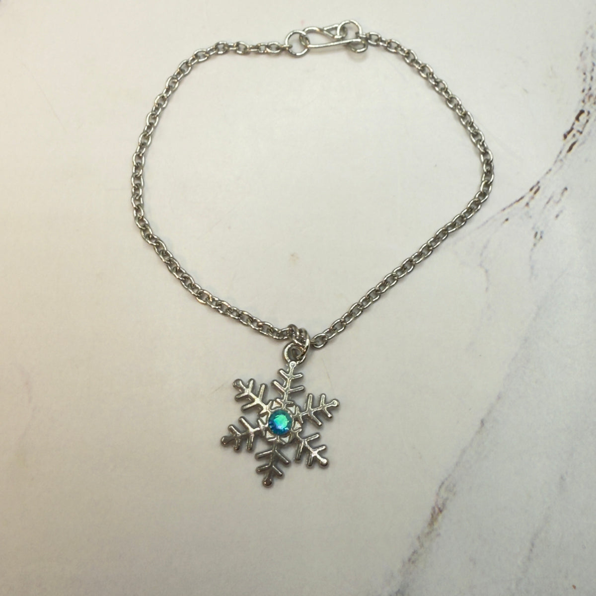 ✨Handmade Doll Jewelry Designed to Fit popular 18 Inch Fashion Dolls: add a touch of “Winter Style ❄️” to your favorite doll!✨

Silver Snowflake Blue Rhinestone Doll Necklace
