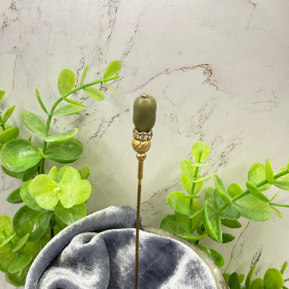 ✨ Handmade Vintage-Inspired Hatpin | Stick Pin | Hat Accessory | Sweater & Hijab Pin | Decorative Jewelry Gift for Her ✨

Olive Green Topper - Clear Rhinestone Band - Textured Gold Tone Base Hatpin - 6 Inch