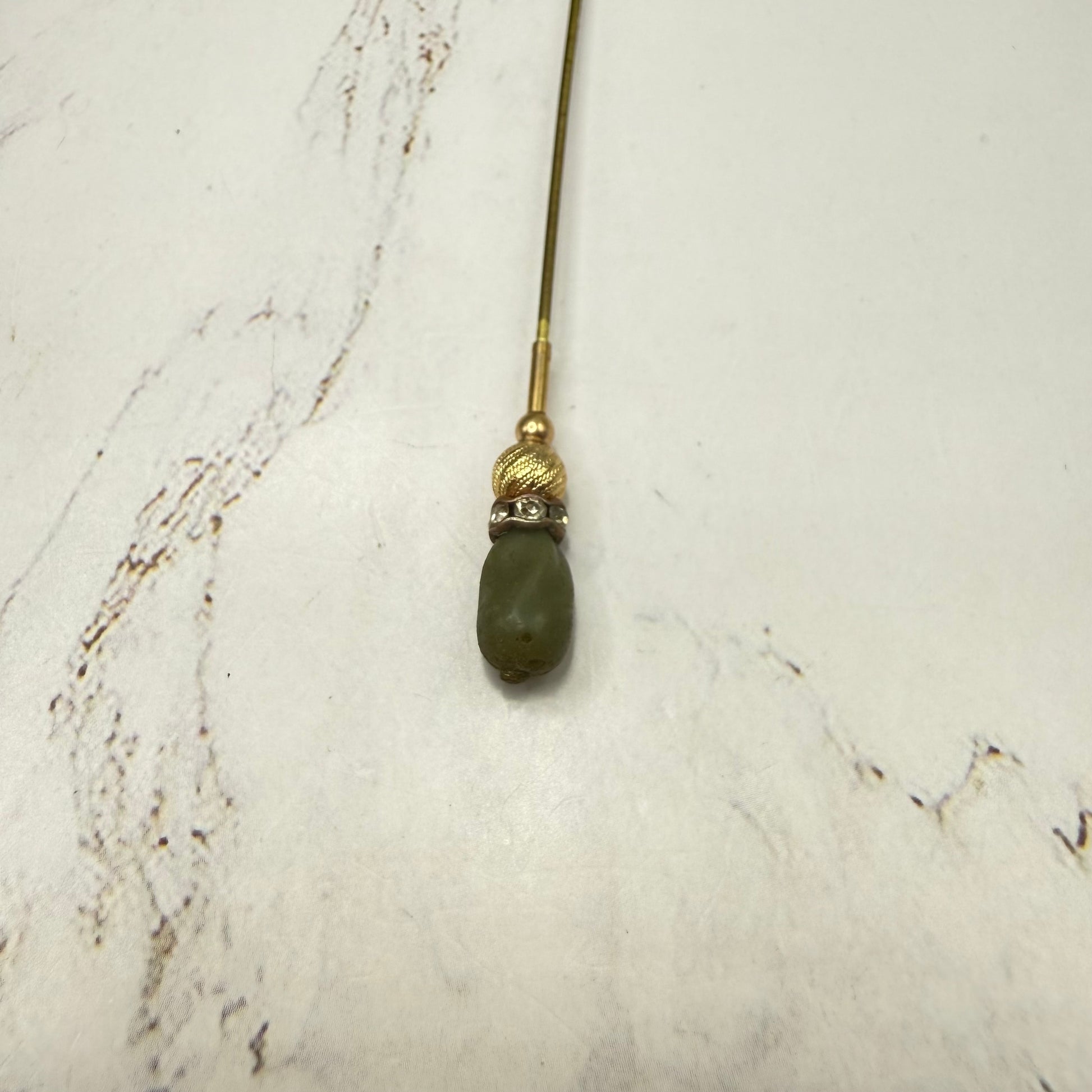 ✨ Handmade Vintage-Inspired Hatpin | Stick Pin | Hat Accessory | Sweater & Hijab Pin | Decorative Jewelry Gift for Her ✨

Small Olive Green Glass Topper - Clear Rhinestone Band - Textured Gold Tone Base Hatpin - 6 Inch