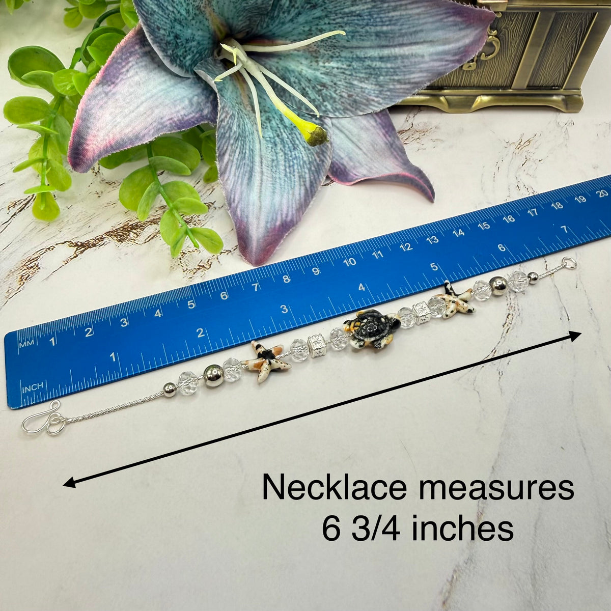 ✨Handmade Doll Jewelry Designed to Fit popular 18 Inch Fashion Dolls: add a little “Summer Fun ☀️ Beachy Style 🏝️” to your favorite doll!✨

Black Yellow Starfish Sea Turtle Charm Clear Crystal Beaded Doll Necklace