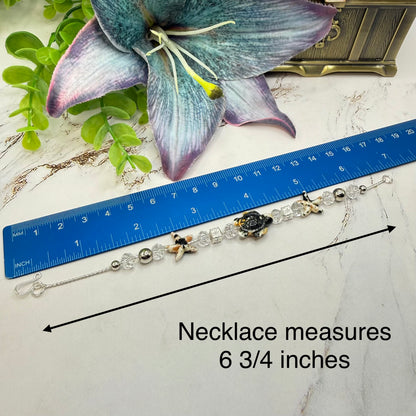✨Handmade Doll Jewelry Designed to Fit popular 18 Inch Fashion Dolls: add a little “Summer Fun ☀️ Beachy Style 🏝️” to your favorite doll!✨

Black Yellow Starfish Sea Turtle Charm Clear Crystal Beaded Doll Necklace
