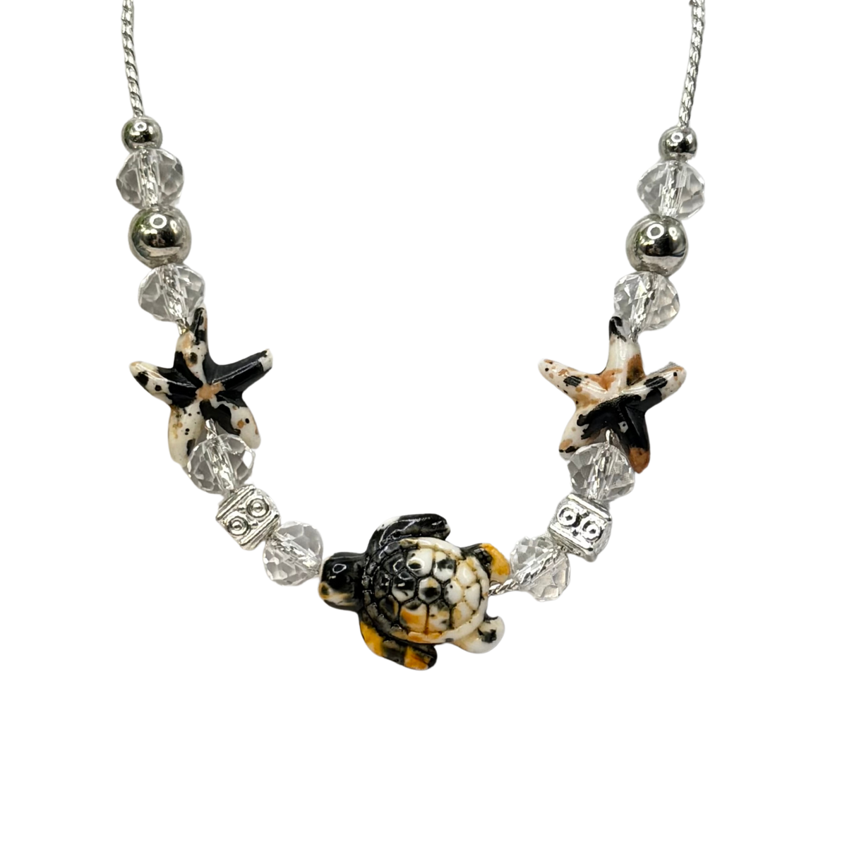 ✨Handmade Doll Jewelry Designed to Fit popular 18 Inch Fashion Dolls: add a little “Summer Fun ☀️ Beachy Style 🏝️” to your favorite doll!✨

Black Yellow Starfish Sea Turtle Charm Clear Crystal Beaded Doll Necklace