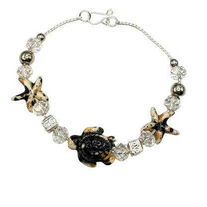 ✨Handmade Doll Jewelry Designed to Fit popular 18 Inch Fashion Dolls: add a little “Summer Fun ☀️ Beachy Style 🏝️” to your favorite doll!✨

Black Yellow Starfish Sea Turtle Charm Clear Crystal Beaded Doll Necklace