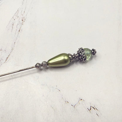 ✨ Handmade Vintage-Inspired Hatpin | Stick Pin | Hat Accessory | Sweater & Hijab Pin | Decorative Jewelry Gift for Her ✨

Teardrop Light Green Faux Pearl & Faceted Glass Crystal Silver Filigree Hatpin - 6 Inch