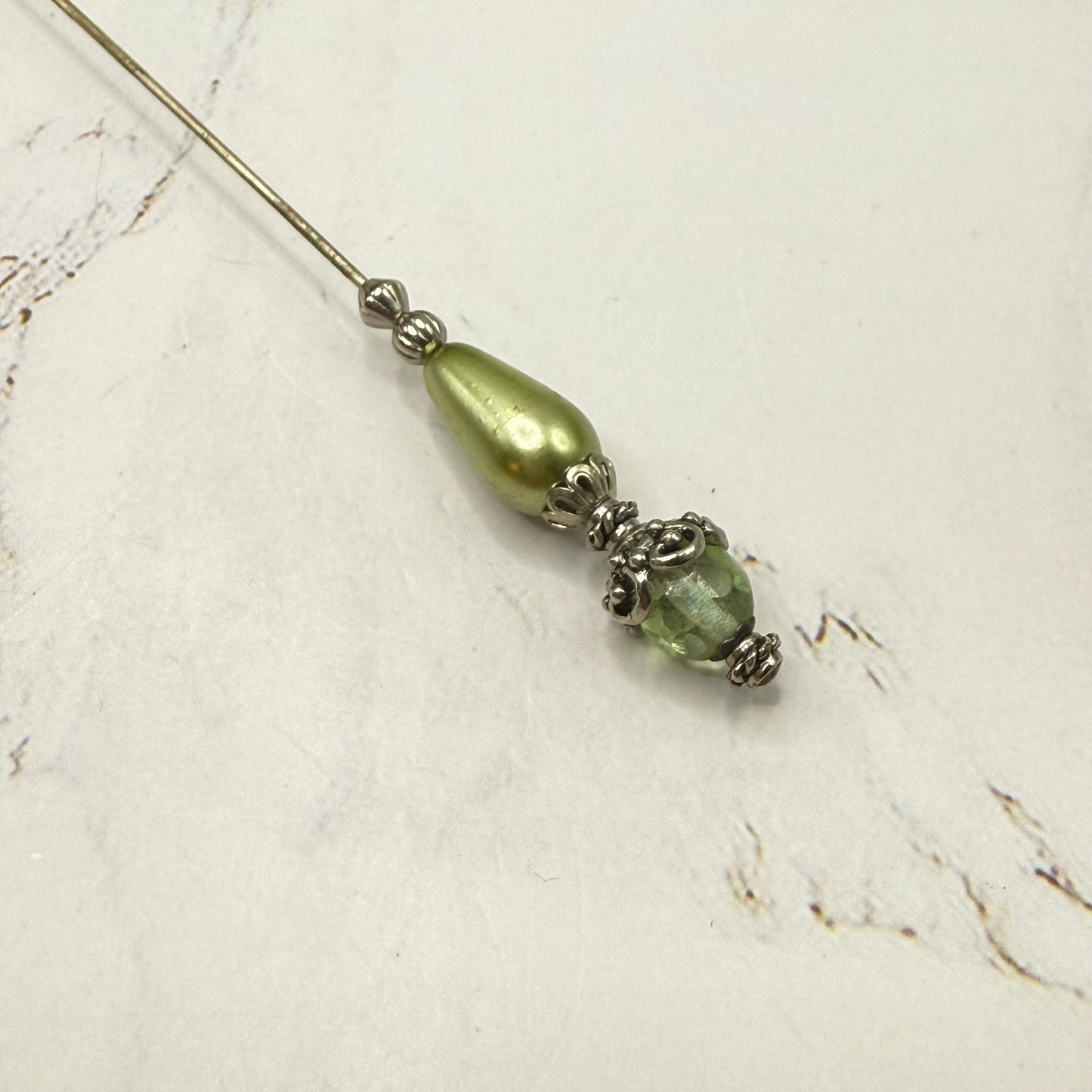 ✨ Handmade Vintage-Inspired Hatpin | Stick Pin | Hat Accessory | Sweater & Hijab Pin | Decorative Jewelry Gift for Her ✨

Teardrop Light Green Faux Pearl & Faceted Glass Crystal Silver Filigree Hatpin - 6 Inch