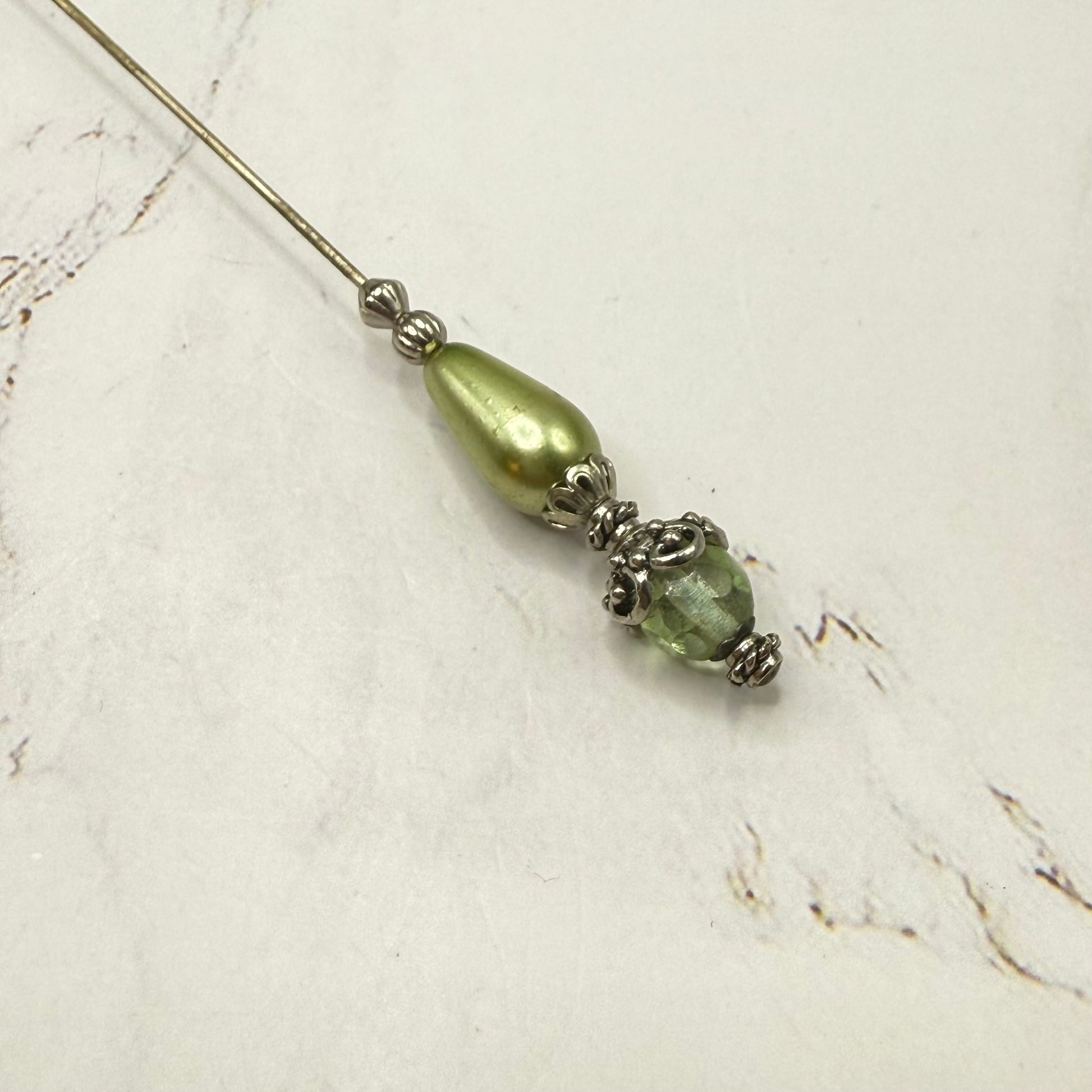 ✨ Handmade Vintage-Inspired Hatpin | Stick Pin | Hat Accessory | Sweater & Hijab Pin | Decorative Jewelry Gift for Her ✨

Teardrop Light Green Faux Pearl & Faceted Glass Crystal Silver Filigree Hatpin - 6 Inch