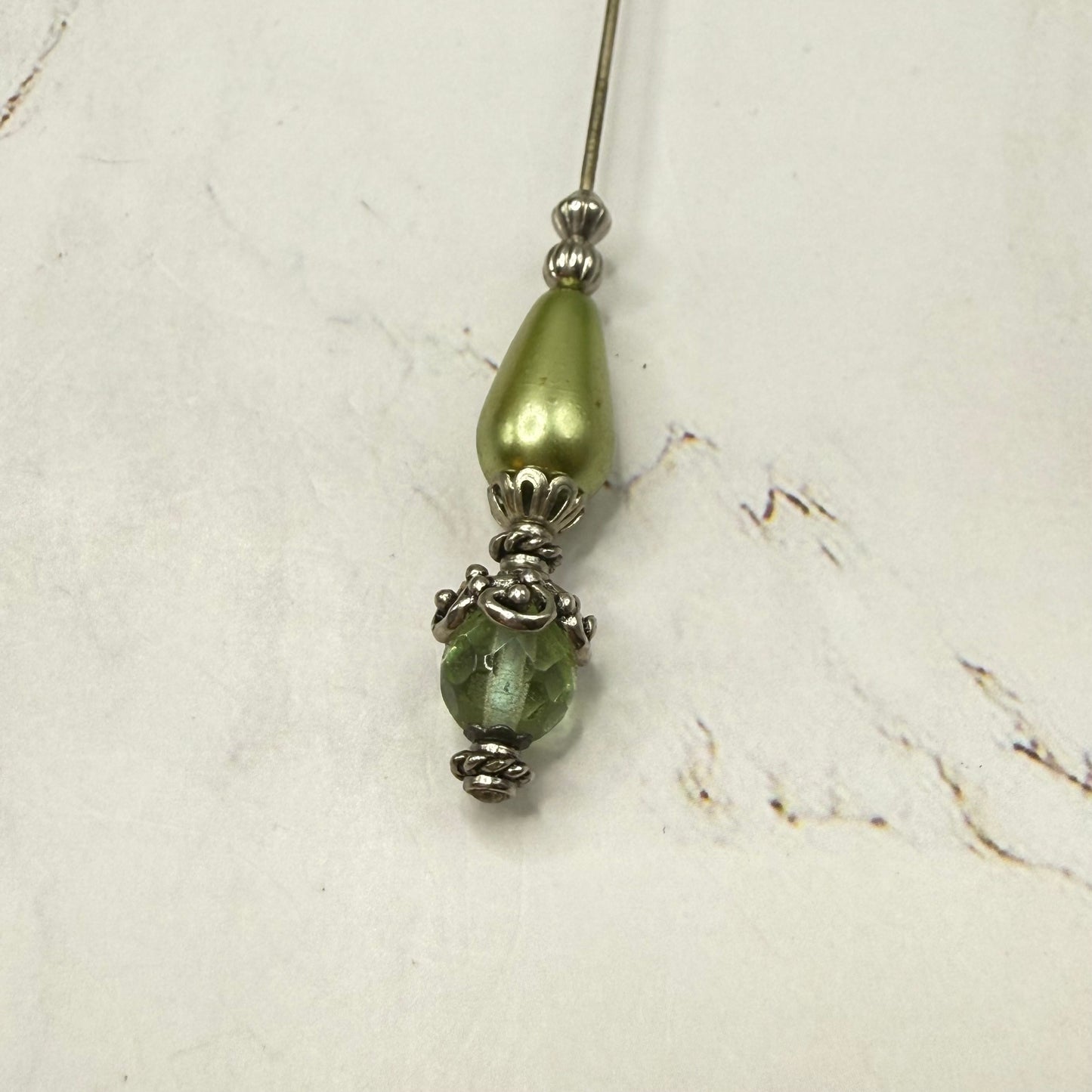 ✨ Handmade Vintage-Inspired Hatpin | Stick Pin | Hat Accessory | Sweater & Hijab Pin | Decorative Jewelry Gift for Her ✨

Teardrop Light Green Faux Pearl & Faceted Glass Crystal Silver Filigree Hatpin - 6 Inch
