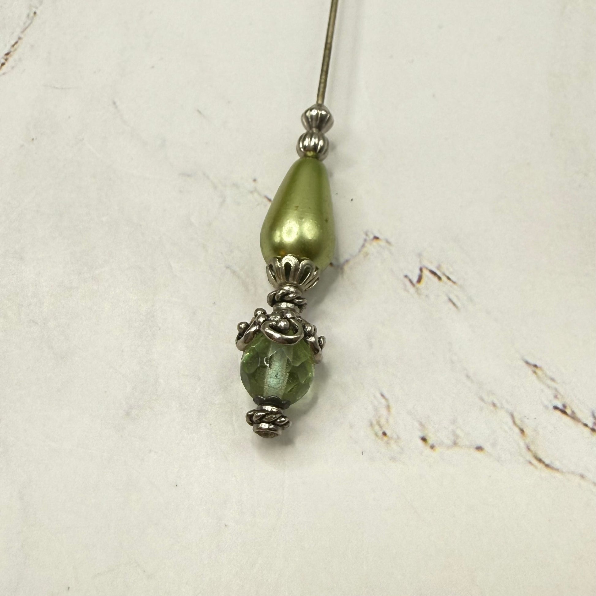 ✨ Handmade Vintage-Inspired Hatpin | Stick Pin | Hat Accessory | Sweater & Hijab Pin | Decorative Jewelry Gift for Her ✨

Teardrop Light Green Faux Pearl & Faceted Glass Crystal Silver Filigree Hatpin - 6 Inch