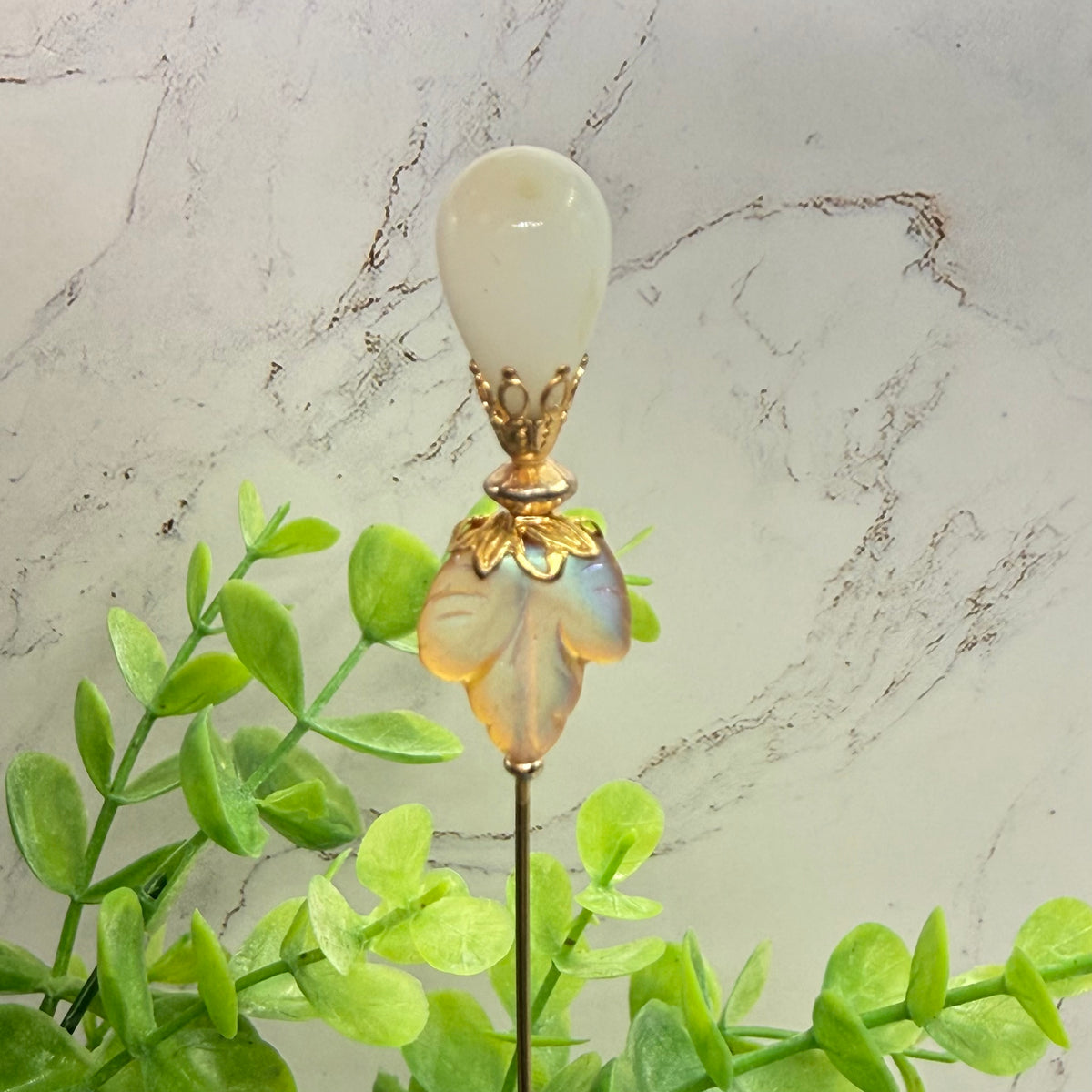 ✨ Handmade Vintage-Inspired Hatpin | Stick Pin | Hat Accessory | Sweater & Hijab Pin | Decorative Jewelry Gift for Her ✨

Teardrop White Glass Iridescent Yellow Golden Design 6 Inch Hatpin