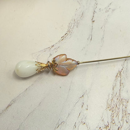 ✨ Handmade Vintage-Inspired Hatpin | Stick Pin | Hat Accessory | Sweater & Hijab Pin | Decorative Jewelry Gift for Her ✨

Teardrop White Glass Iridescent Yellow Golden Design 6 Inch Hatpin