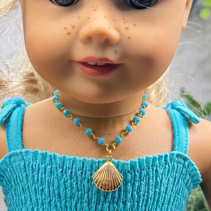 Handmade Doll Jewelry Designed to Fit popular 18 Inch Fashion Dolls: add a little “Summer Fun ☀️ Beachy Style 🏝️” to your favorite doll! Turquoise Blue Crystal Beaded Gold Seashell Charm Doll Necklace