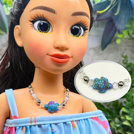 ✨Handmade Doll Jewelry Designed to Fit popular 18 Inch Fashion Dolls: add a little “Summer Fun ☀️ Beachy Style 🏝️” to your favorite doll!✨

Turquoise Purple Turtle Charm Clear Crystal and Silver Beaded Doll Necklace