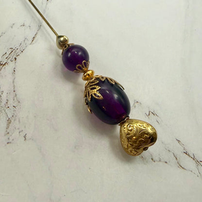 ✨ Handmade Vintage-Inspired Hatpin | Stick Pin | Hat Accessory | Sweater & Hijab Pin | Decorative Jewelry Gift for Her ✨

Deep Purple Class Gold Tone Heart-Shaped Top Finial and Filigree Hatpin • 6 Inch
