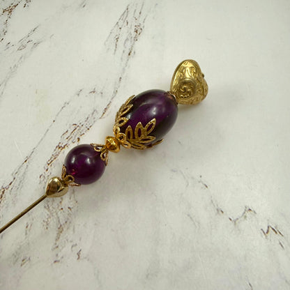✨ Handmade Vintage-Inspired Hatpin | Stick Pin | Hat Accessory | Sweater & Hijab Pin | Decorative Jewelry Gift for Her ✨

Deep Purple Class Gold Tone Heart-Shaped Top Finial and Filigree Hatpin • 6 Inch
