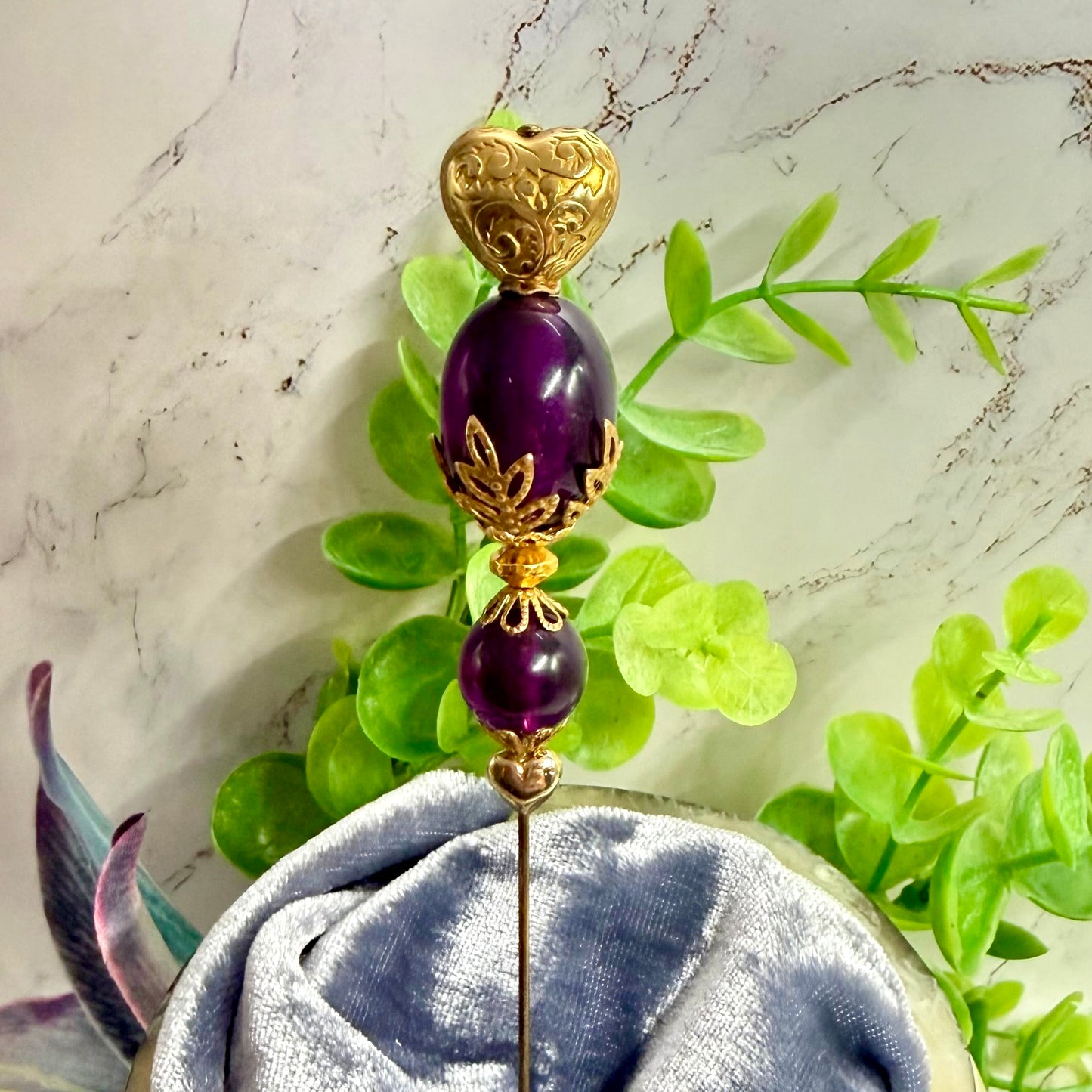 ✨ Handmade Vintage-Inspired Hatpin | Stick Pin | Hat Accessory | Sweater & Hijab Pin | Decorative Jewelry Gift for Her ✨

Deep Purple Class Gold Tone Heart-Shaped Top Finial and Filigree Hatpin • 6 Inch
